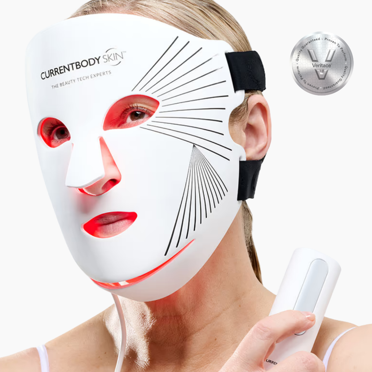 CurrentBody Skin LED Red Light Therapy Face Mask showing a sleek black mask with red LED lights for skincare treatment.