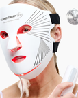 CurrentBody Skin LED Red Light Therapy Face Mask showing a sleek black mask with red LED lights for skincare treatment.