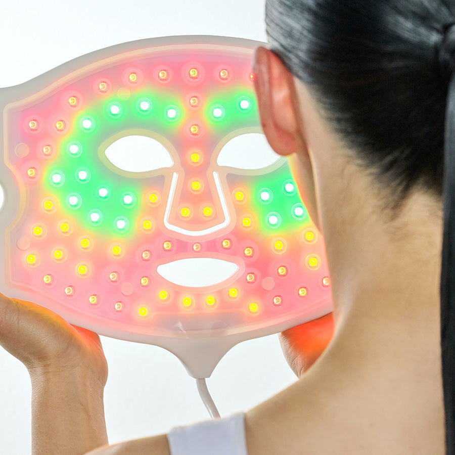 CurrentBody Skin LED 4-in-1 Zone Facial Mapping Mask showing a sleek black facial mask with LED lights for skin therapy.