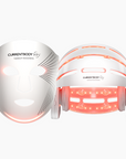 CurrentBody Skin LED Hair Growth Helmet showing a sleek, black device with multiple LED light panels for promoting hair growth.