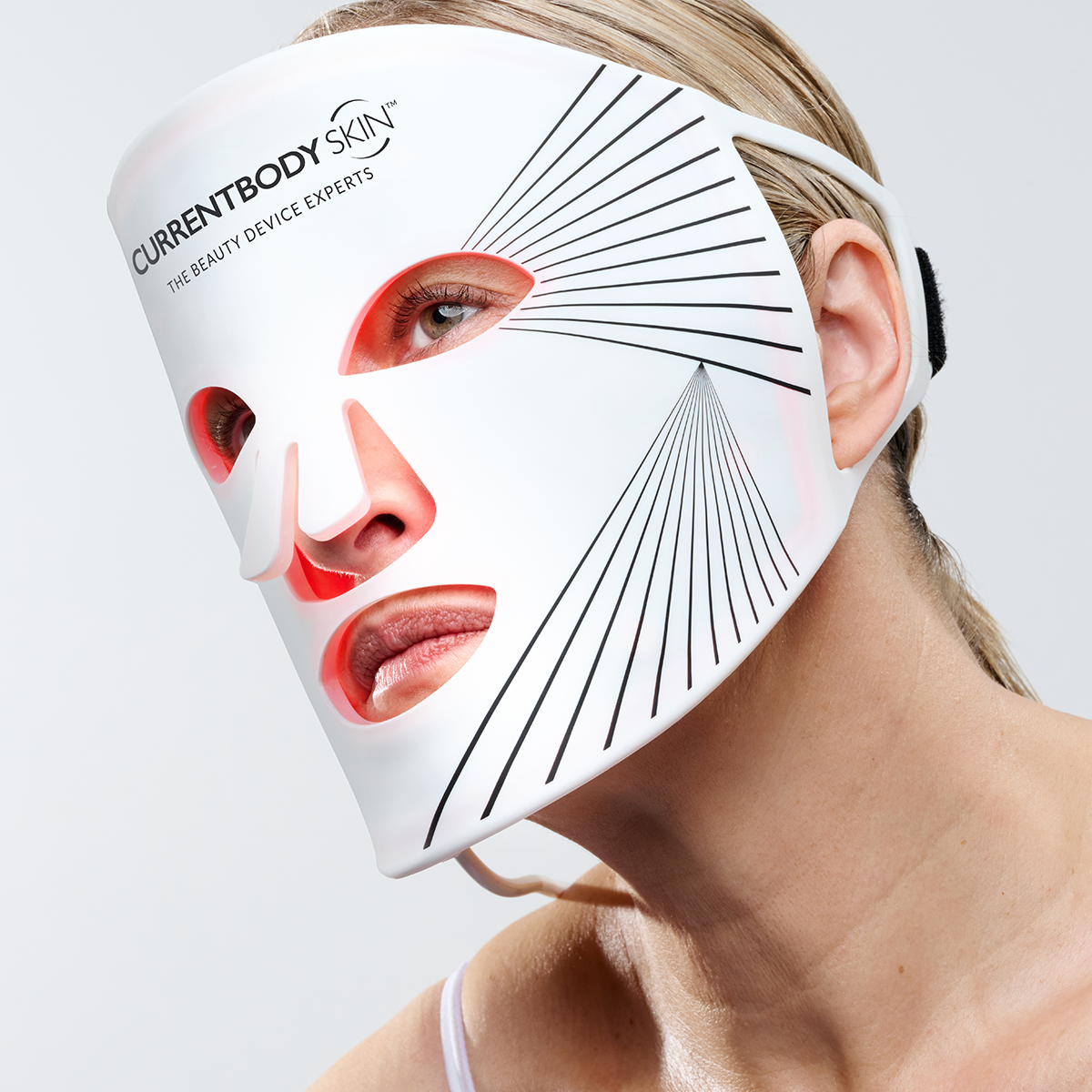 CurrentBody Skin LED face mask and 30ml green tea serum, skincare devices for facial therapy and rejuvenation.