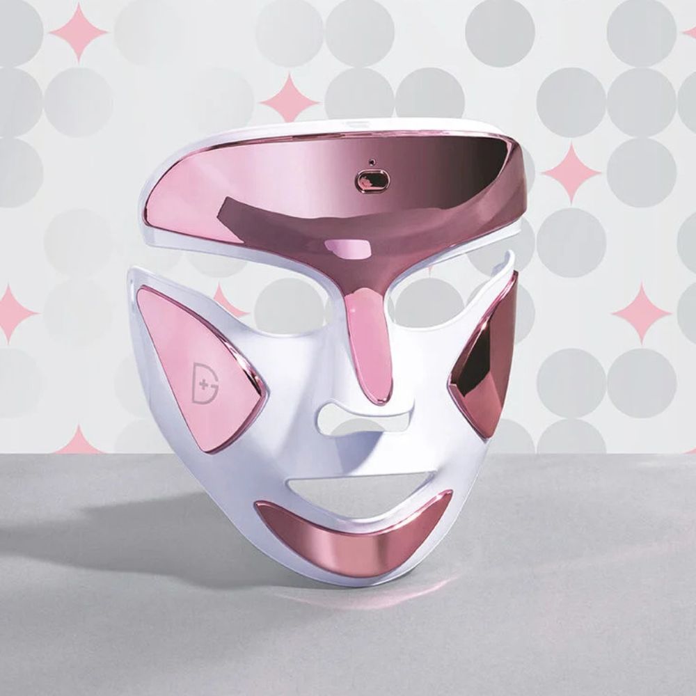 Dr. Dennis Gross DrX SpectraLite FaceWare Pro in Power Pink, facial treatment device with LED light therapy, shown on a clean background.