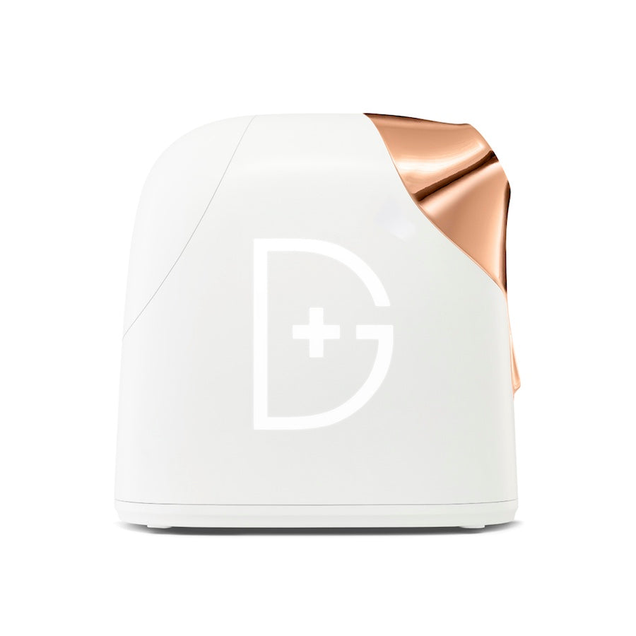 Yolaine Dr. Dennis Gross Pro Facial Steamer device for skincare, showing the sleek handheld facial steamer on a white background.