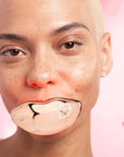 Dr. Dennis Gross DrX Spectralite Lipware Pro device with LED light therapy for lip skincare, shown in a close-up image.