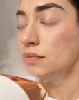 Yolaine Dr. Dennis Gross Pro Facial Steamer device for deep facial skin hydration and cleansing.