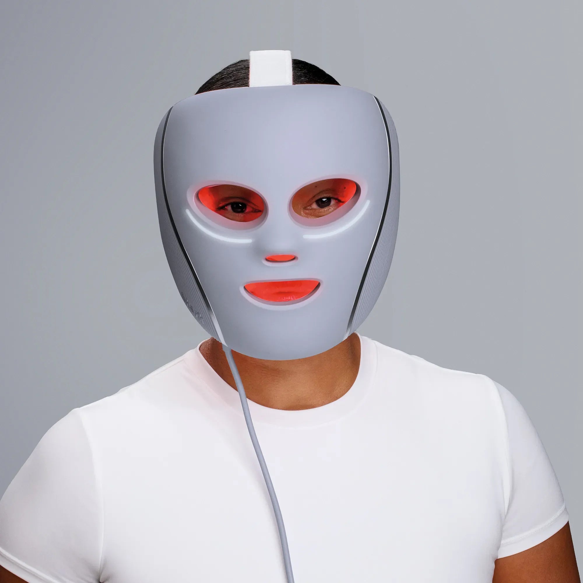 Shark Clean CryoGlow under-eye cooling and LED face mask showing the mask’s blue LED lights and cooling surface.
