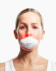CurrentBody Skin LED Lip Mask showing a sleek, red-lit device designed for lip skincare and rejuvenation.