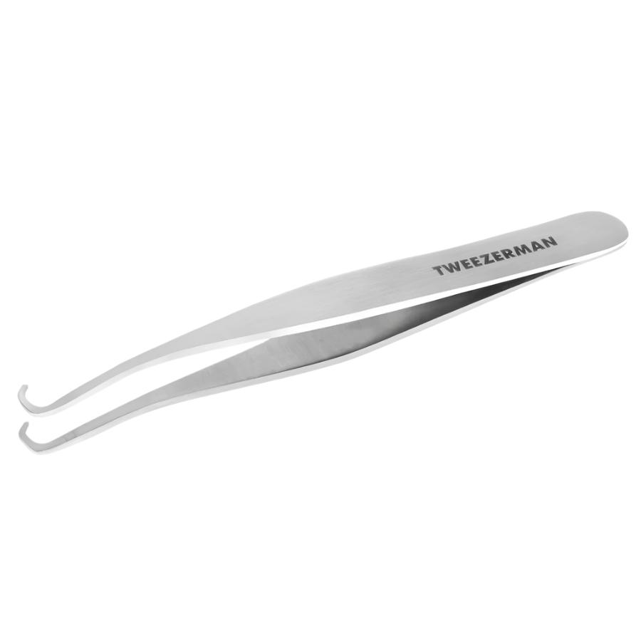 Yolaine Tweezerman blackhead extractor tool with stainless steel loop for pore cleansing and blackhead removal.