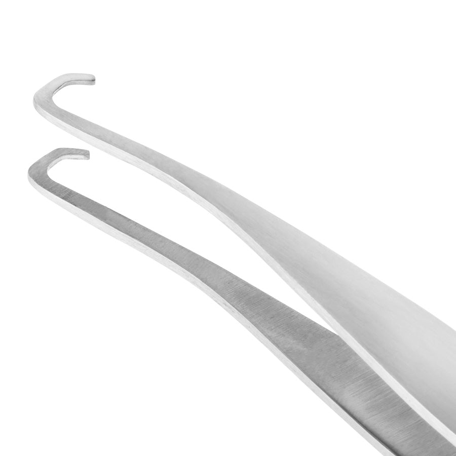 Yolaine Tweezerman blackhead extractor tool with stainless steel tip for safe pore extraction and skincare.