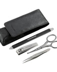 Tweezerman Essential Grooming Kit with nail clippers, tweezers, and scissors arranged in a compact case for personal grooming.
