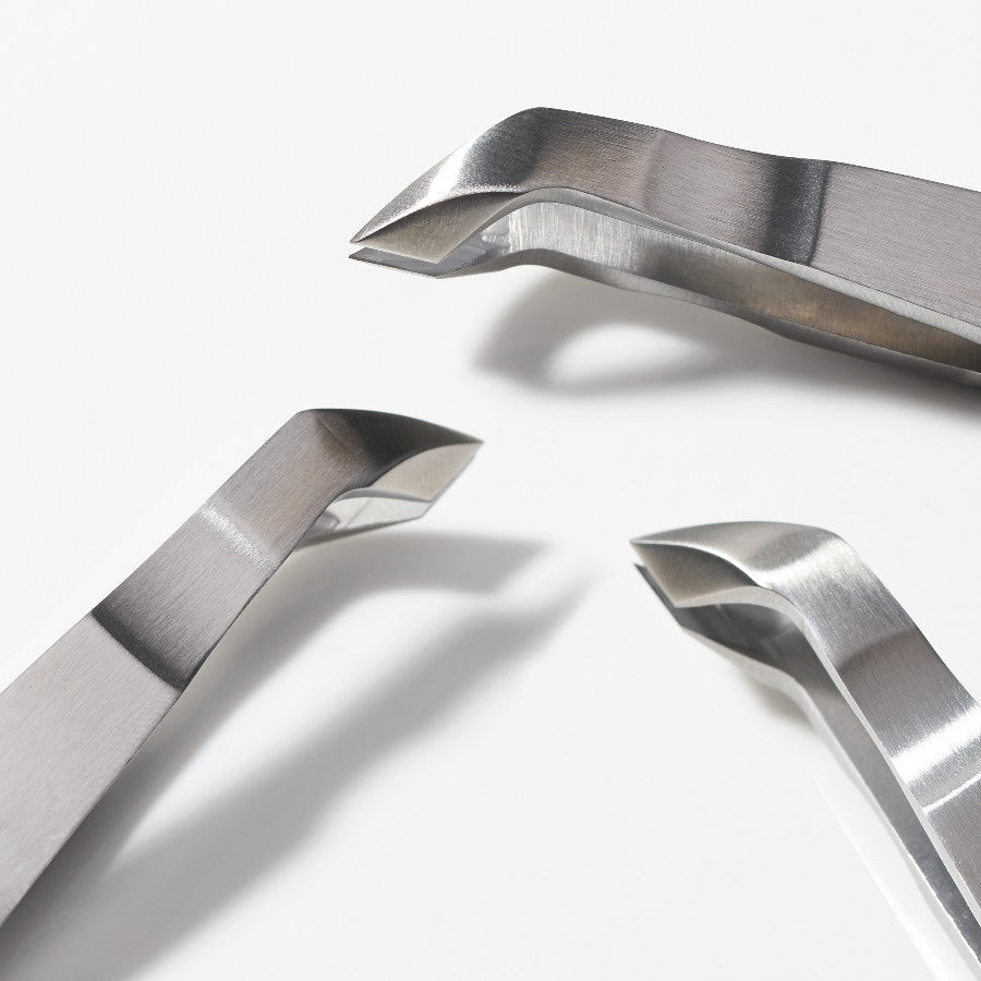 Yolaine Tweezerman mini cuticle nipper with precision stainless steel blades for gentle cuticle trimming.