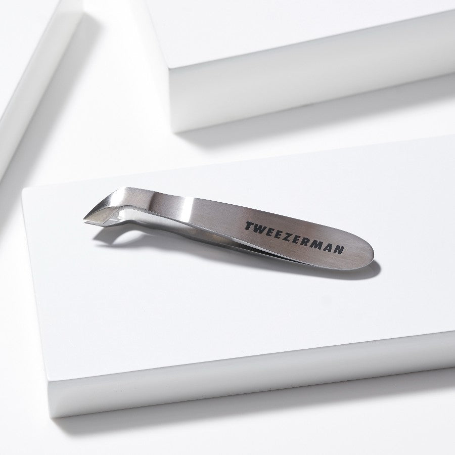 Yolaine Tweezerman mini cuticle nipper with sharp precision blades for grooming cuticles and hangnails.