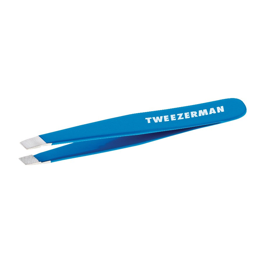 Yolaine Tweezerman Mini Slant Tweezer in Bahama Blue, compact stainless steel grooming tool for precise eyebrow shaping.