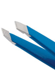 Yolaine Tweezerman Mini Slant Tweezer in Bahama Blue with precise slanted tip for grooming eyebrows and small hair removal