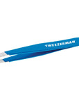 Yolaine Tweezerman Mini Slant Tweezer in Bahama Blue, compact stainless steel grooming tool for precise eyebrow shaping.