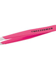 Pink Tweezerman Mini Slant Tweezer by Yolaine with precise slant tip for eyebrow grooming and detail plucking.