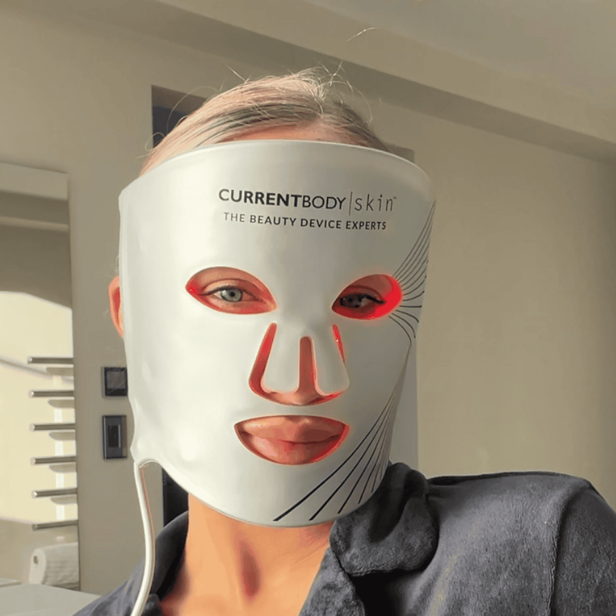Silver Series 1 LED Mask by CurrentBody Skin with adjustable straps and sleek silver design for facial skincare.