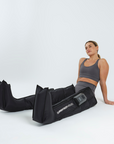 CurrentBody Skin wellness sauna blanket and recovery compression boots, showing the boots with open design and adjustable straps.