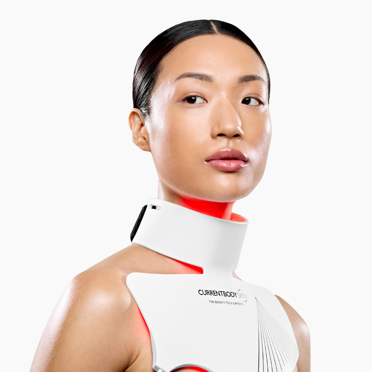 CurrentBody Skin LED Neck &amp; Décolletage Mask shown from a side view, highlighting the sleek design and adjustable strap for targeted skincare.