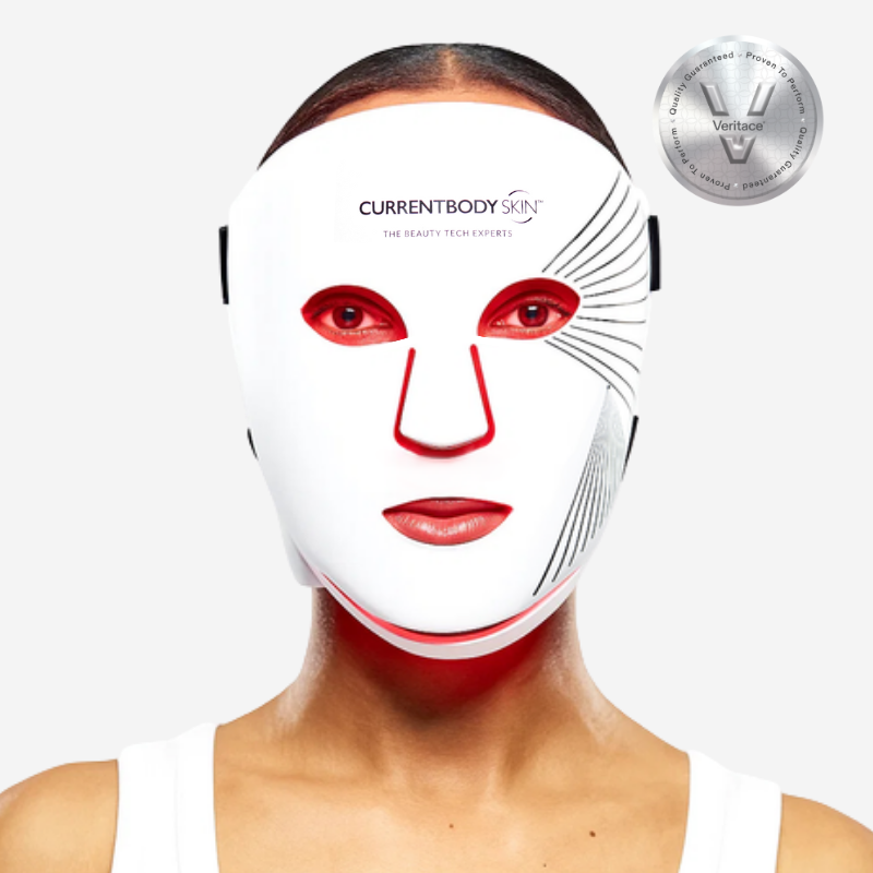 CurrentBody Skin LED Red Light Therapy Face Mask shown on a person, designed for skin rejuvenation and facial treatment.