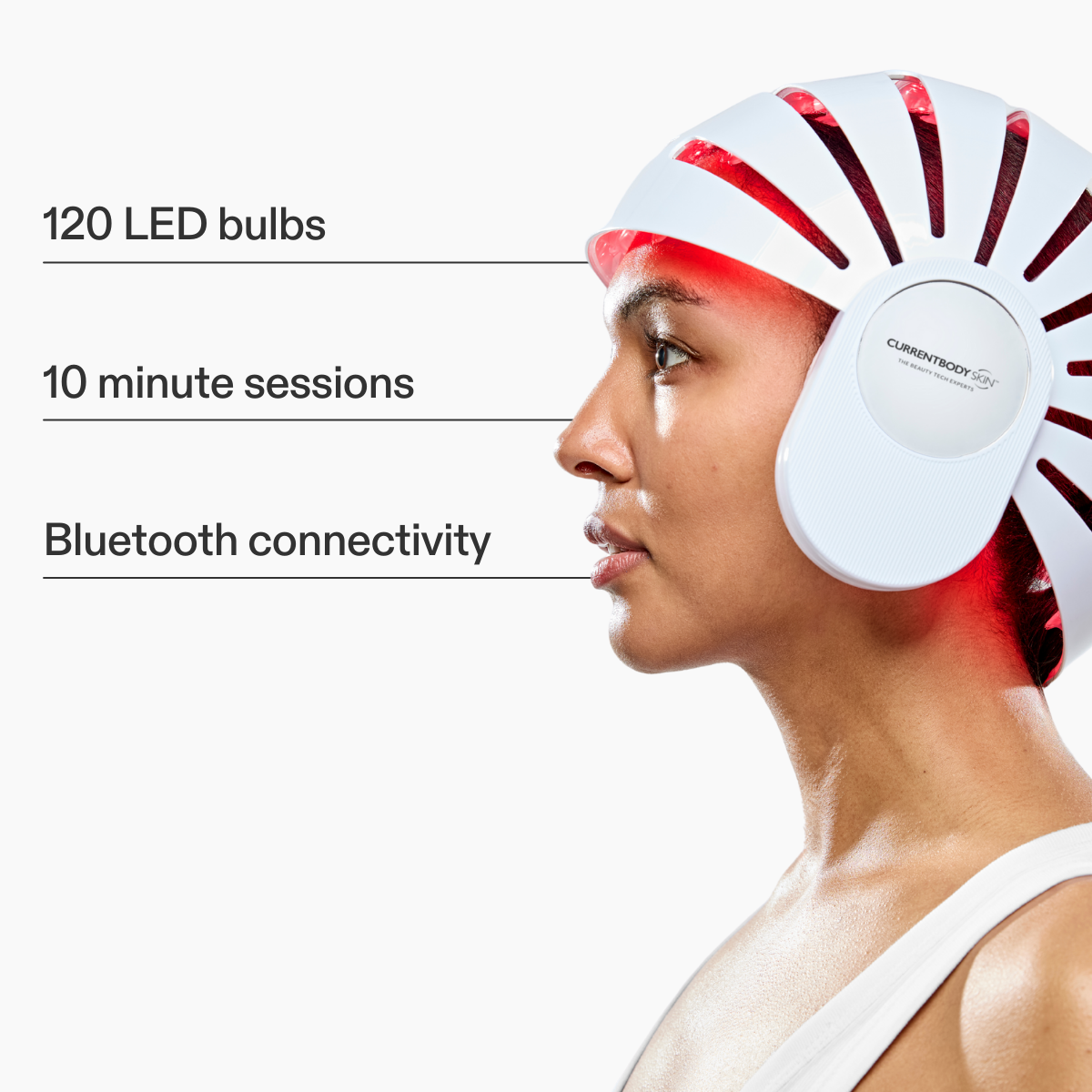 Side view of CurrentBody Skin LED Hair Growth Helmet showing its sleek design and adjustable fit for scalp treatment.