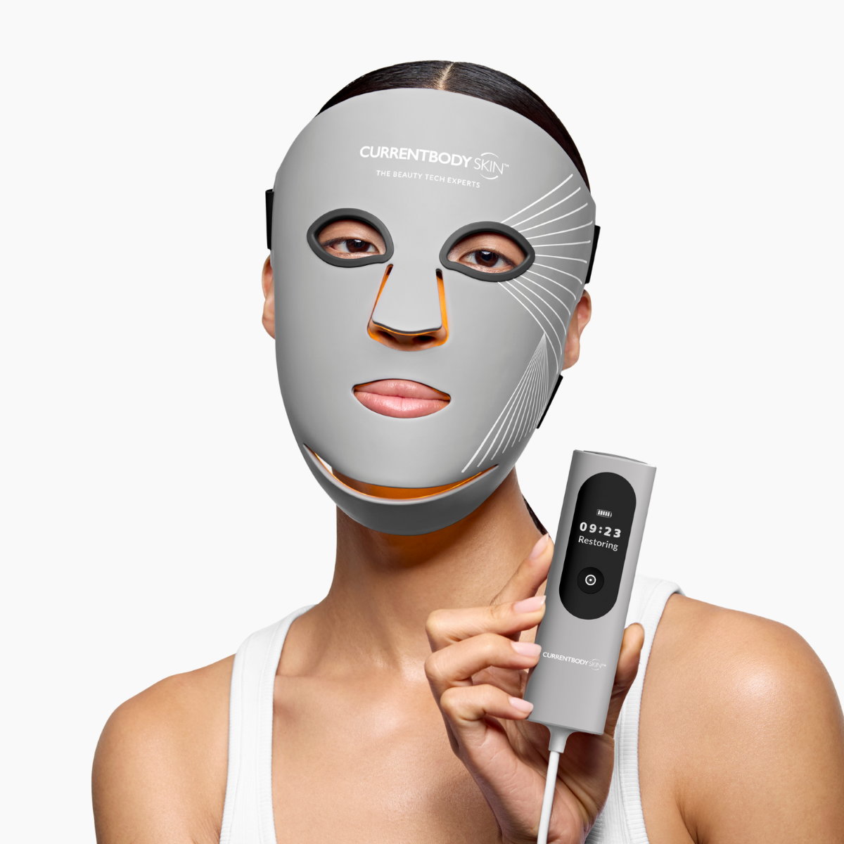 CurrentBody Skin LED Multi Light Therapy Mask controller with buttons and display for skincare treatment control.