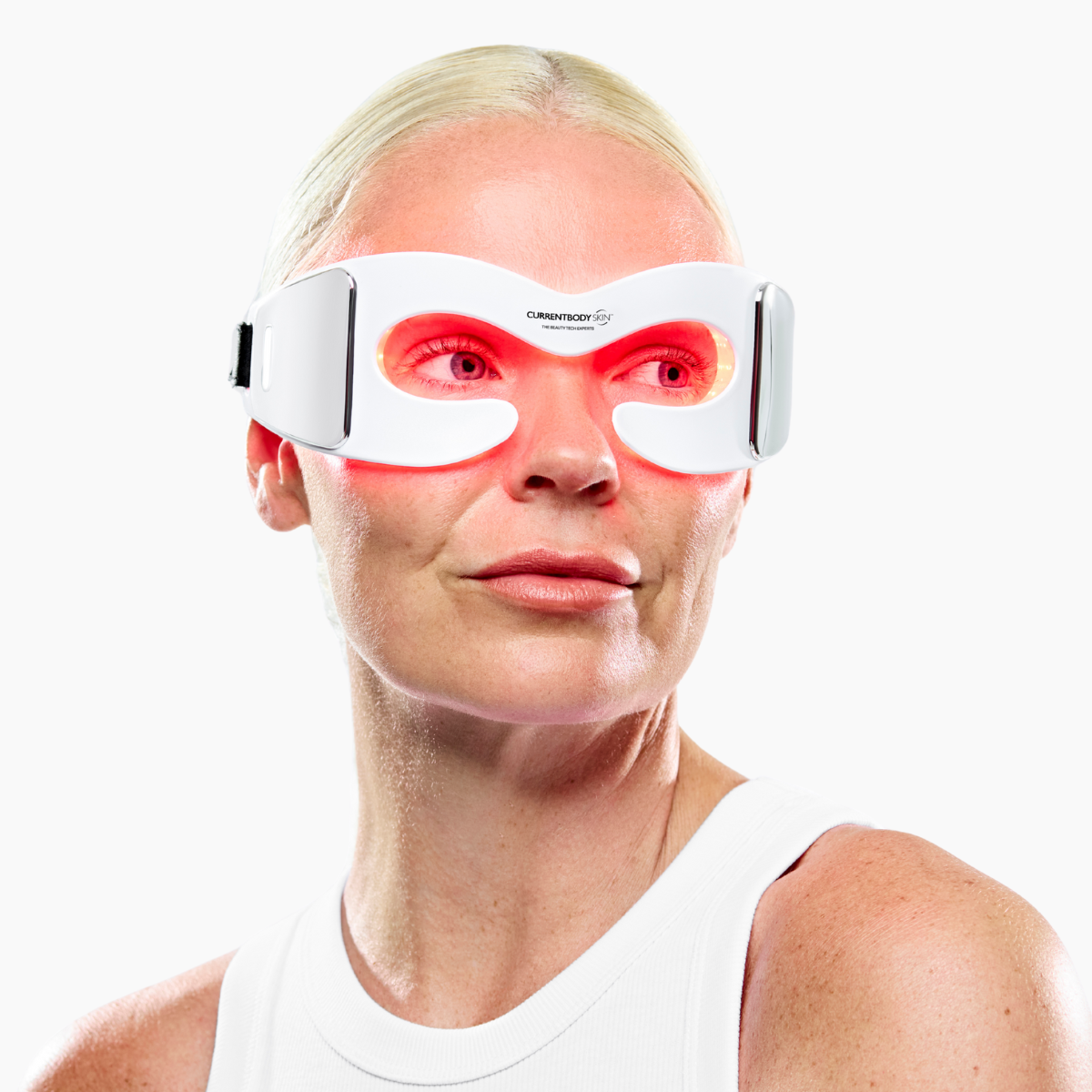 CurrentBody Skin LED eye mask shown in a close-up, featuring a sleek black design with adjustable straps for targeted eye treatment.