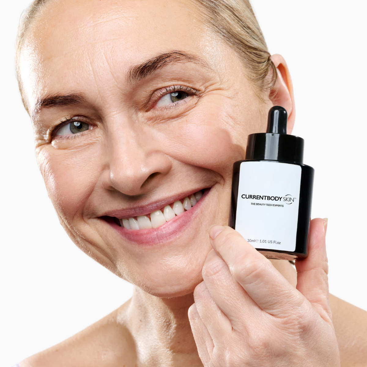 CurrentBody Skin Green Tea Serum in a 30ml bottle, featuring a clear container with green tea-infused skincare serum inside.