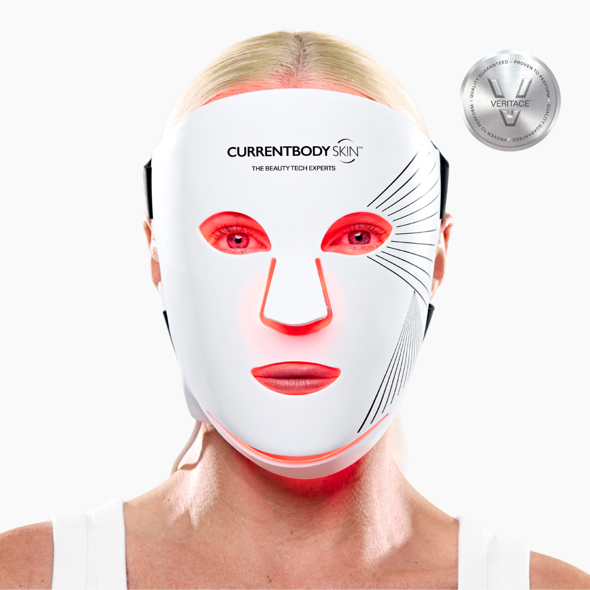 CurrentBody Skin LED Face &amp; Neck Kit Series 2 with red light therapy mask turned on, highlighting the facial area and sleek design.