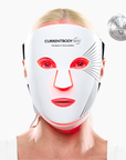 CurrentBody Skin LED Face & Neck Kit Series 2 with red light therapy mask turned on, highlighting the facial area and sleek design.