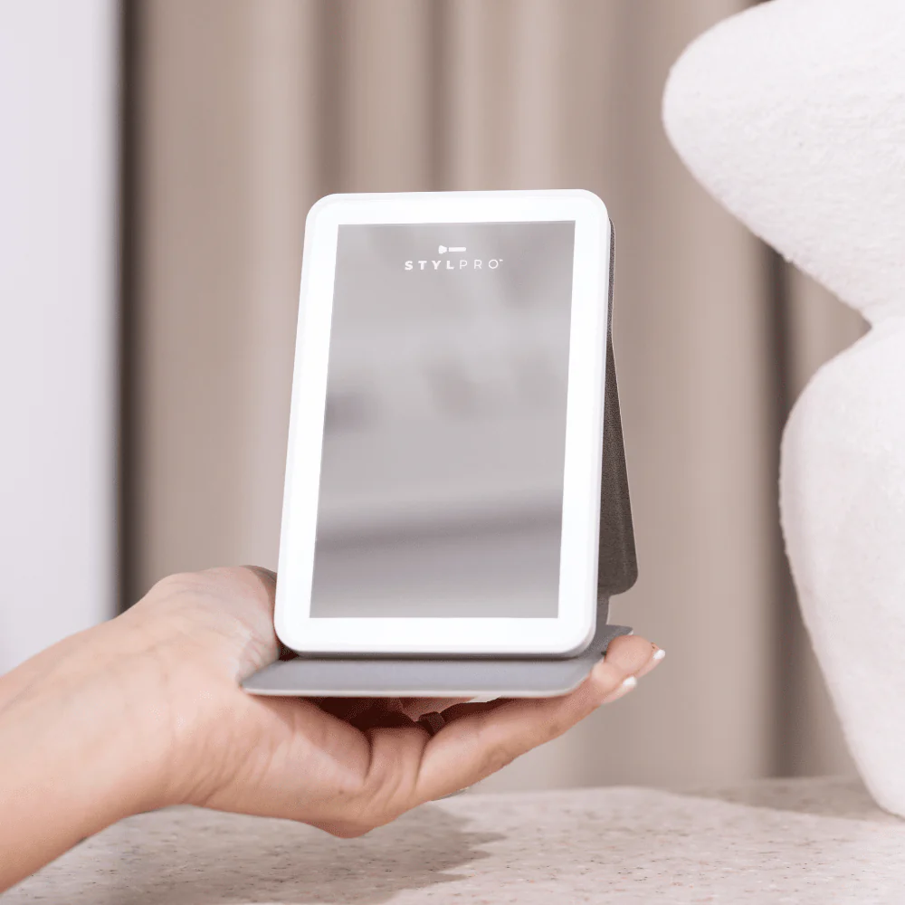 LEDMASKCONCEPT StylPro LED Mini Mirror with bright light, compact design, perfect for detailed makeup application and grooming.