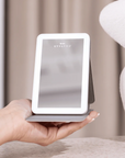 LEDMASKCONCEPT StylPro LED Mini Mirror with bright light, compact design, perfect for detailed makeup application and grooming.