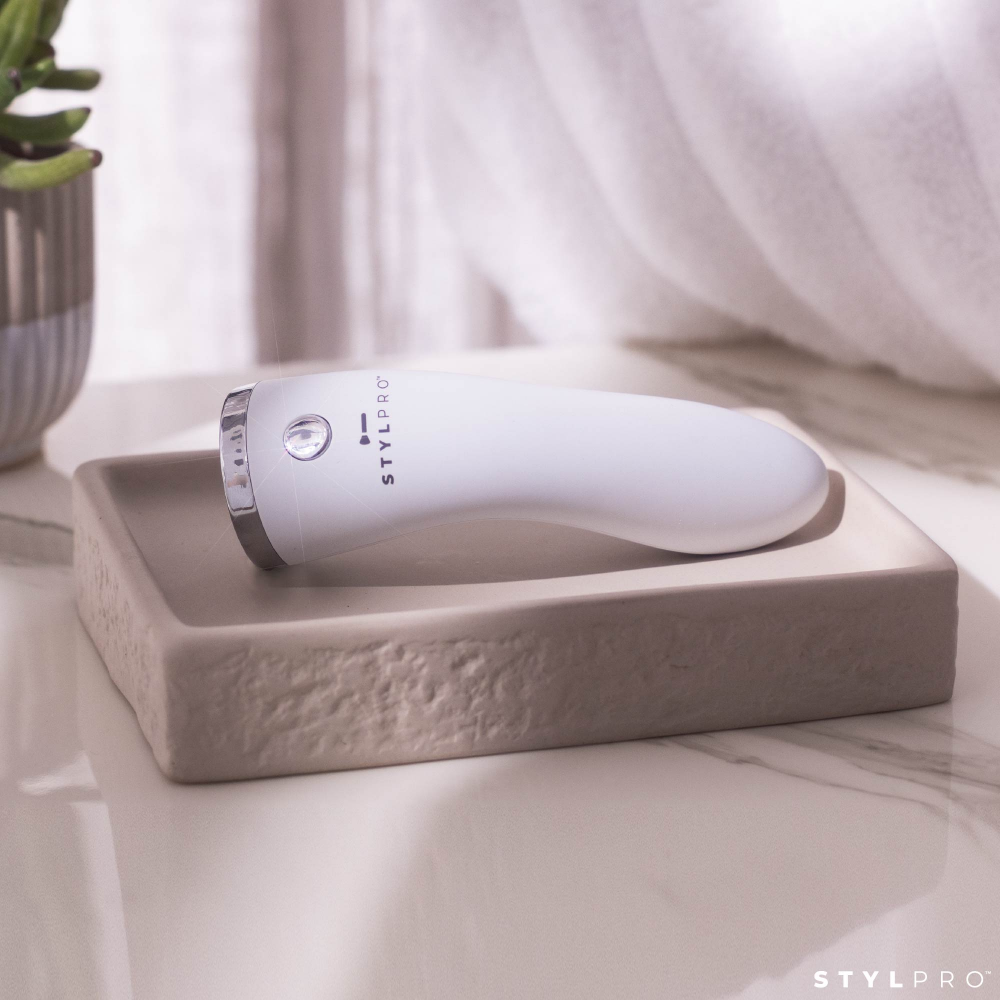 LEDMASKCONCEPT StylPro Mini LED Wand showing a compact, handheld LED light device with adjustable settings for skincare or beauty treatments.