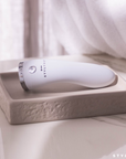 LEDMASKCONCEPT StylPro Mini LED Wand showing a compact, handheld LED light device with adjustable settings for skincare or beauty treatments.