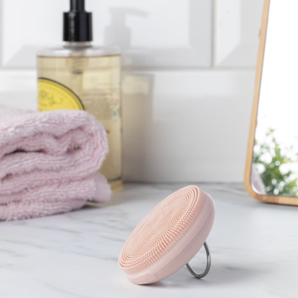 LEDMASKCONCEPT StylPro Routine Facial Cleansing Device with soft silicone attachments and ergonomic design for deep skin cleansing.